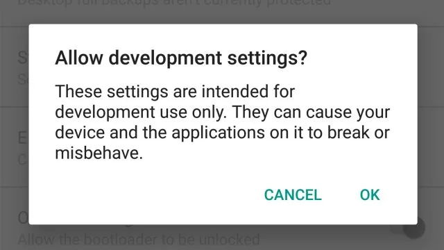 Увімкніть параметри розробника
Google приховує деякі з найсучасніших інструментів у спеціальному меню "Налаштування розробника", які вам потрібно буде ввімкнути, щоб отримати такі переваги, як швидкість анімації, налагодження USB та очікування додатків (про що я на мить займемося). Щоб увімкнути параметри розробника, відкрийте меню "Про телефон" у нижній частині налаштувань системи та знайдіть номер збірки. Натисніть на це сім раз, і ви отримаєте повідомлення про те, що ви розробник. Варіанти Dev тепер будуть внизу основних налаштувань системи.