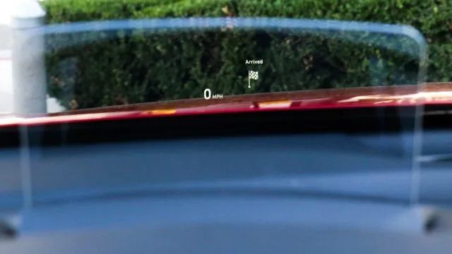 Kona EV uses a collimator, a reflective plastic pop up, that projects important info into the driver’s line of sight. It’s a good way to produce an affordable head-up display.