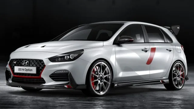 The i30 N "N Option" is Hyundai&#039;s new customization suite for the i30 sporty crossover/hatchback. By specifying from a range of performance and appearance options, buyers can set apart their own cars with a carbon wing, carbon fiber hood, quad mufflers, an N grille, and lightweight cast alloy wheels.