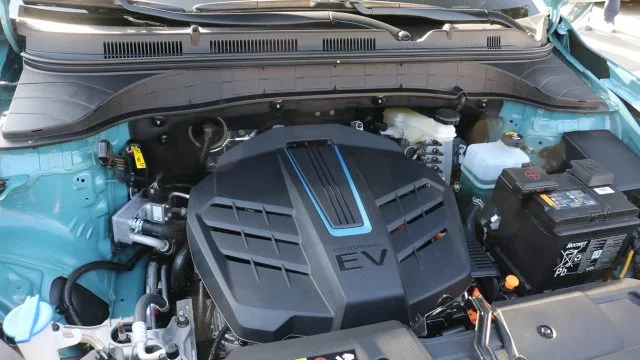 Engine bay of the Kona EV holds the electric motor, accessories battery, and necessary fluids. Main battery is below the front-rear seats.