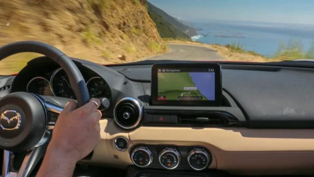 Zoom-zooming down to the Pacific Coast in the MX-5 convertible north of Monterey. With the higher redline, you can stay in second gear up to 7,200-7,500 rpm; no need to upshift to third and then downshift for the corner ahead. (Bill Howard photo)