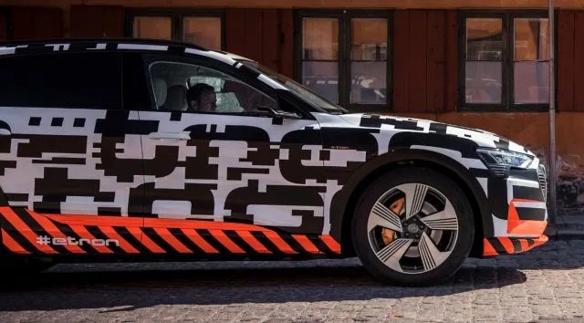 С его CEO Busted, Audi Teases e-tron Interior, Video Side Mirrors