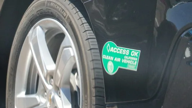 California green clean air sticker, issued to plug-in hybrids. White stickers are for EVs, hydrogen fuel cell vehicles, and some CNG (compresed natural gas) vehicles.