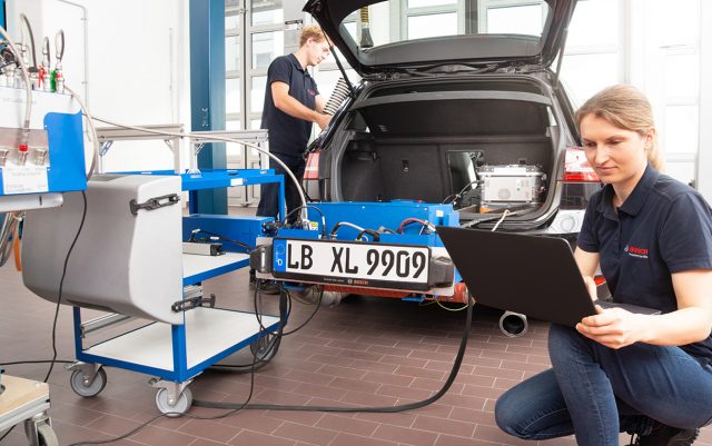 Bosch technicians checking results in the lab. (Bosch)