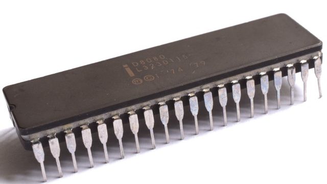 Intel 8080
The Intel 8080 was a 1974 design that followed the 8008 and drastically increased its clock speed, from 500KHz to 2MHz (later chips at up to 3.125MHz would be released). The 8080 was the first chip Faggin designed from scratch, and it used the n-channel MOS process (the 4004 and 8008 had used p-channel MOS), with fewer support chips required and 6000 transistors in the base design. Intel, back then, was known more for its memory than its CPUs, but the 8080 was a huge success in the budding microcomputer market, with prominent design wins and broad industry uptake. The 8080 was the base CPU model used for the fledgling operating system, CP/M. Intel would follow up the 8080 with the 8085 — a binary-compatible CPU with support for 5V operation and several new instructions to support new interrupts. 