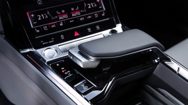 A big console wrist pad provides a touch-screen arm brace and, on the left, a new transmission selector for the Audi e-tron prototype.