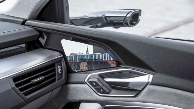 The Audi e-tron crossover concept has rear-facing side-mirror cameras, with displays inside the car.