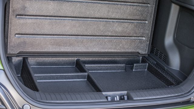 Slick: Hidden storage under the load floor of the Kona. It doesn&#039;t lock, but at least your things are out of sight.