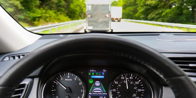 ProPilot Assist functions are shown in the instrument panel: The blue icon means PPA is active. The green steering wheel means steering assist is active. The converging vertical green lines mean the camera sees both left and right pavement markers. And the car icon shows adaptive cruise control has locked onto the vehicle in front, as it’s pacing the front-runner’s speed.