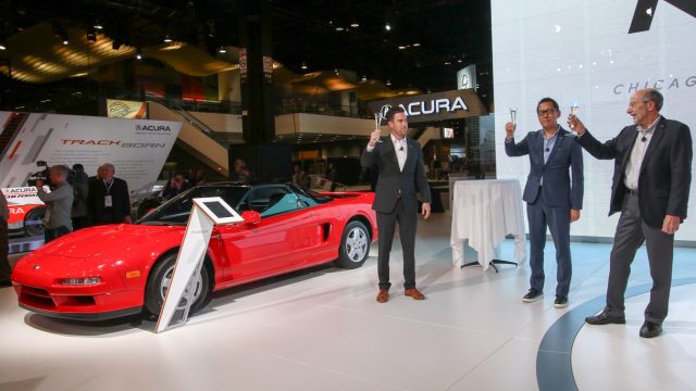 Acura toasted the 30th year of the Acura NSX, introduced at the 1989 Chicago show. On-stage were Acura-Honda PR assistant VP Sage Marie, NSX design director Jon Ikeda, and ex-Car and Driver editor Csaba Csere. The original NSX was a groundbreaker with an all-aluminum body, midship engine, and everyday drivability.