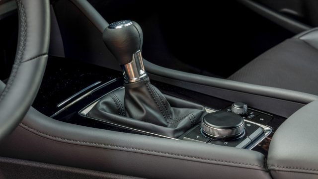 Mazda offers a six-speed manual on the Premium, or top trim line, for the front-drive hatchback only. It&#039;s the same price as the automatic. 