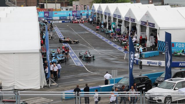 In seasons 1-4, the battery wouldn’t last the entire race, so drivers swapped to a second car around the halfway point. But no more. This is the paddock at the 2018 Brooklyn ePrix, as Formula E is called, race.