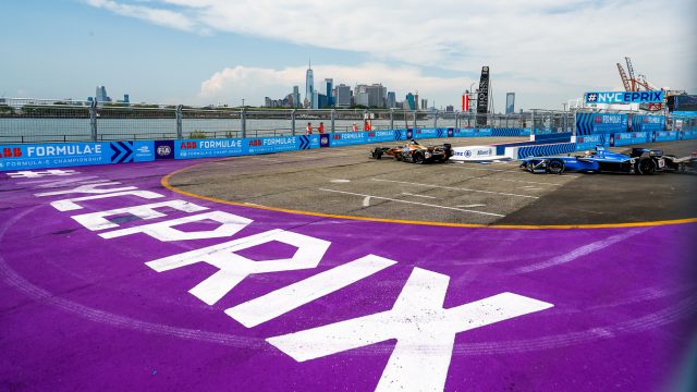 Manhattan skyline in the background of the 2018 Formula E race in Brooklyn’s Red Hook section. While this is a “street circuit,” the track is laid out on roads and parking areas of the Brooklyn cruise ship terminal.