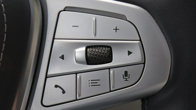 The right side of the wheel has infotainment controls, including a true rolling-barrel control to select among choices such as radio stations. 