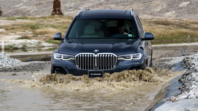 An X7 slides through the primordial soup. Actually, an off-road course at the BMW Performance Center outside Palm Springs, California. The X7 fords up 20 inches of water.