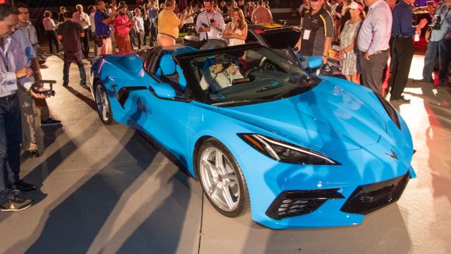 The C8 Corvette convertible, media, and dealers at Wednesday night&#039;s introduction.