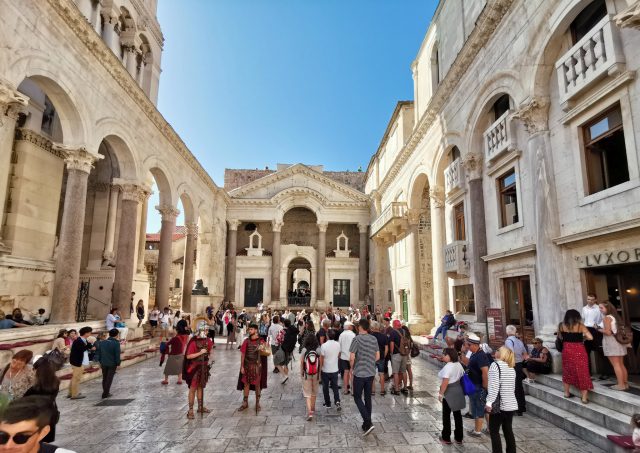 HDR in Diocletian’s Palace, Croatia with plenty of tourists in the scene.