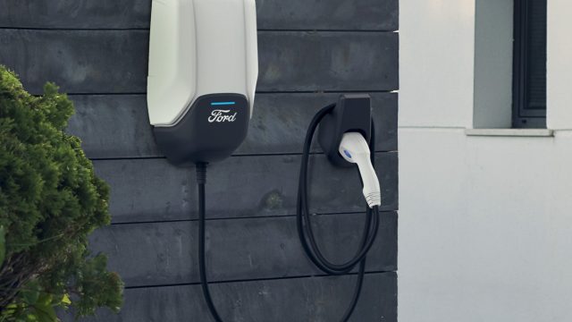 Ford includes a simple charging cable for 120/240 volts, will sell you a 48-amp / 240 volt Level 2 charger (photo) that Amazon will install.