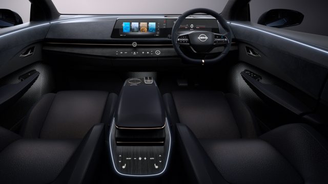 The dash and interior of the new Nissan Ariya, right-hand-drive version. Note the clean flow of the dashboard lines.