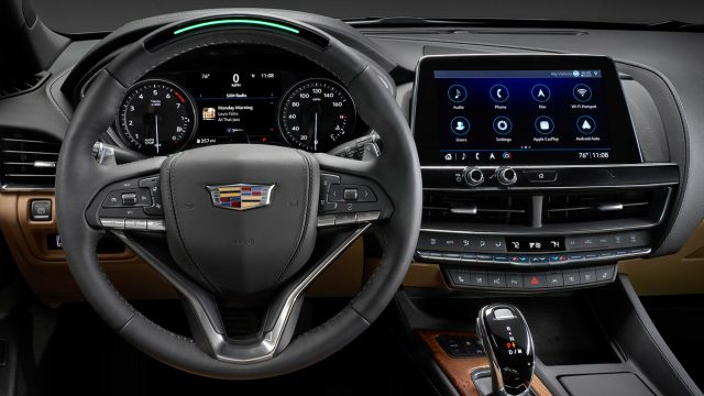 The 2021 Cadillac CT5 midsize sedan. The top of the wheel lights up green when Super Cruise is running.