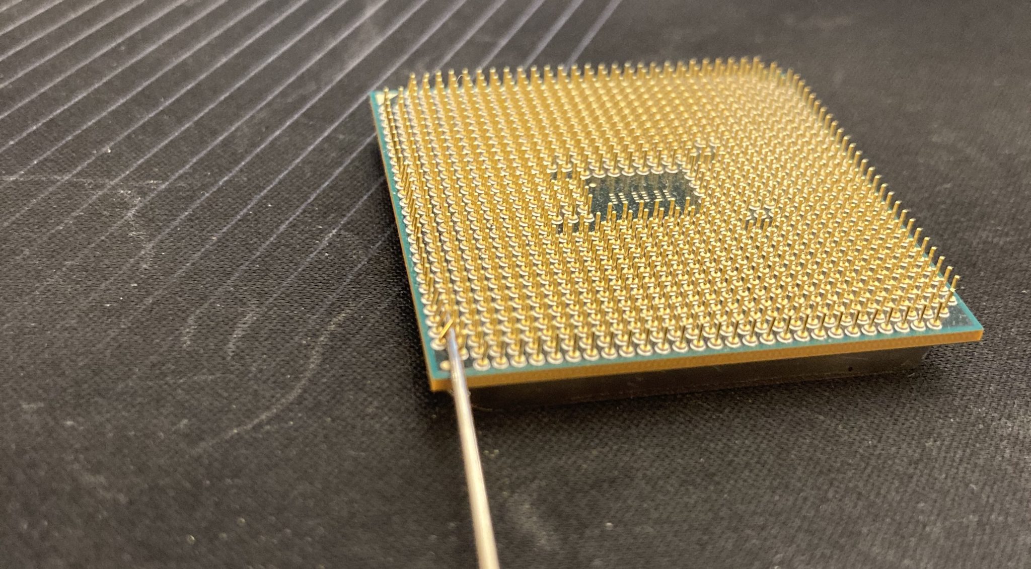 How to Repair Bent AMD CPU Pins With a Mechanical Pencil